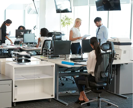Enterprise team working at desks in a shared office