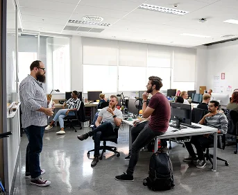 Team meeting in a modern open-plan office