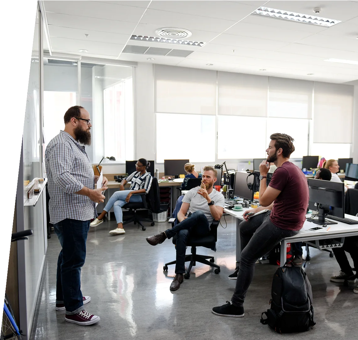 Coworkers collaborating in a modern open-plan office