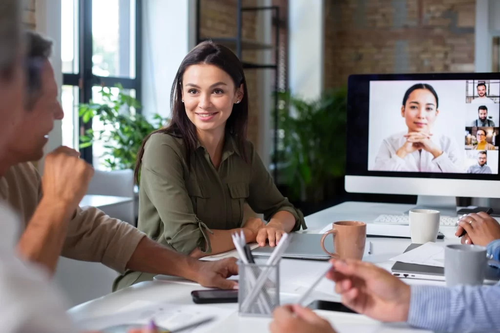 coworkers having a hybrid conference