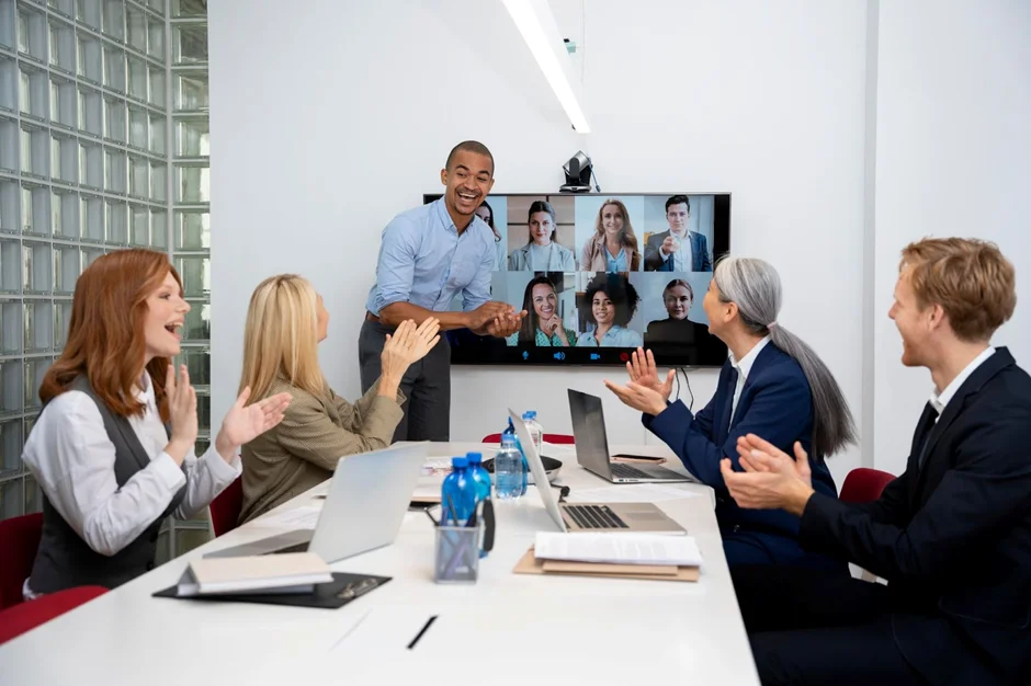 colleagues are cheering up at the meeting room